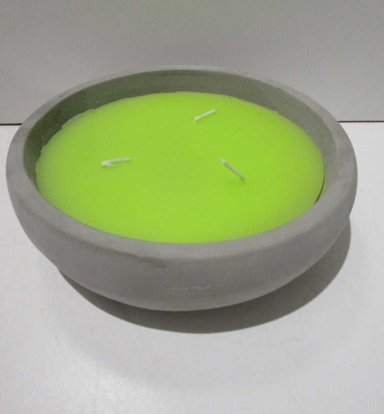 Candle in cement pot green image