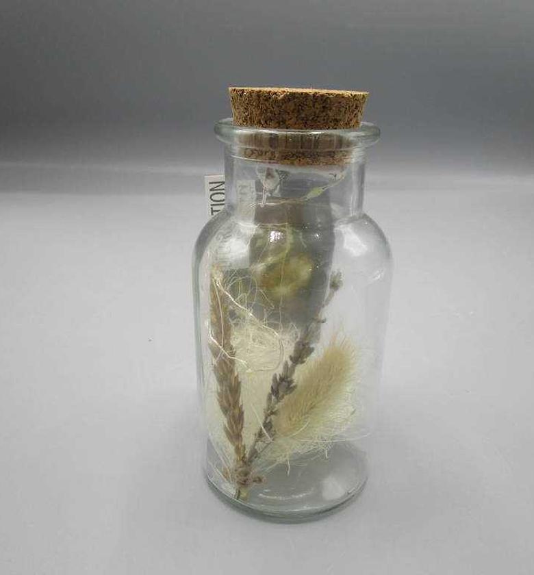 BOTTLE WITH CORK CUDWEED image